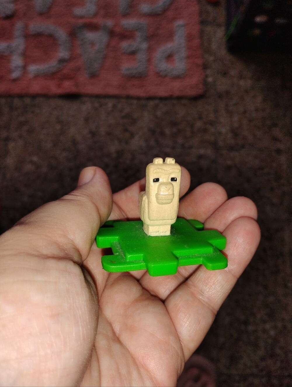 Green Puzzle Perch Toy with Beige Character for Small Pets